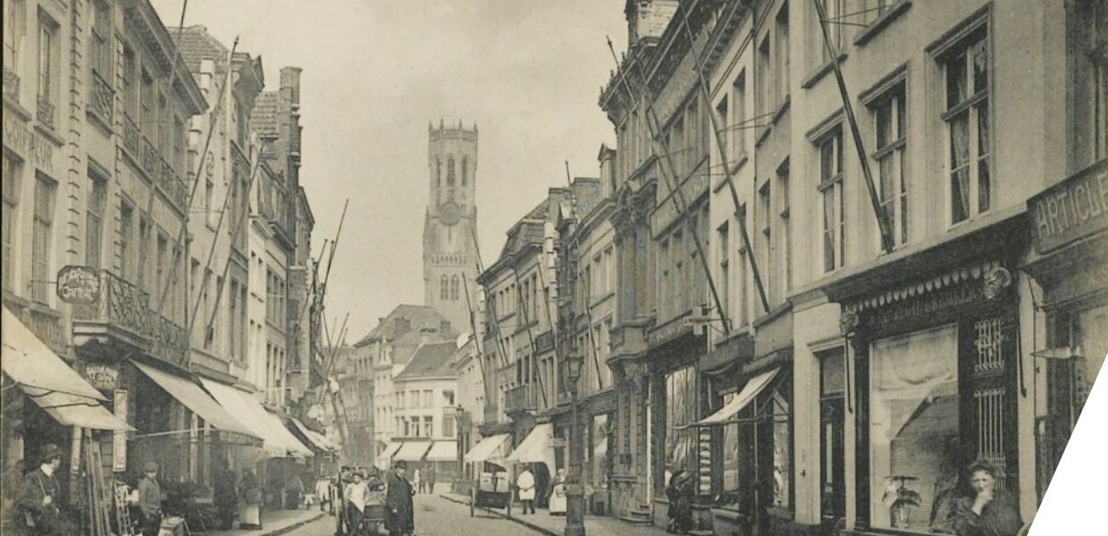 View of Steenstraat in Bruges in the 19th century. A church building is visible in the background.