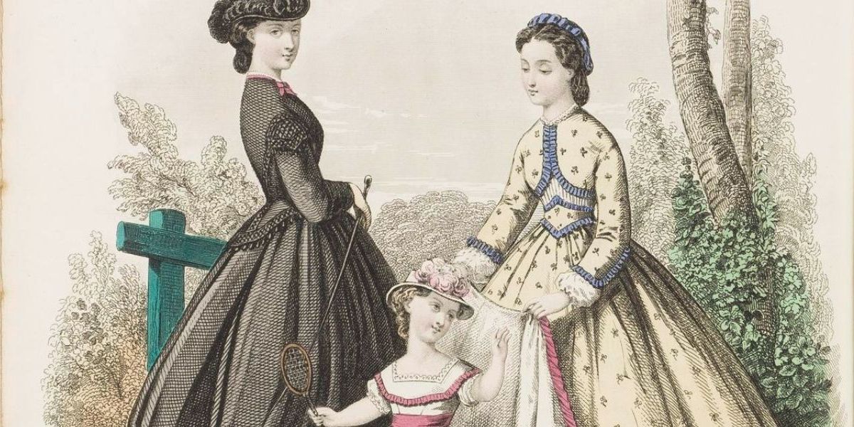 Two women and a small girl walking in the countryside in beautiful dresses