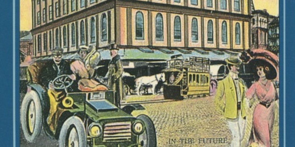 A postcard showing an older car on a busy street