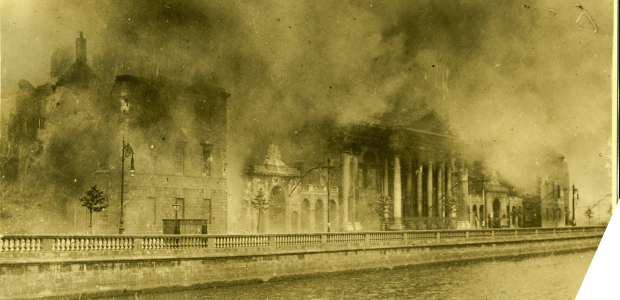 A classical building enveloped in smoke