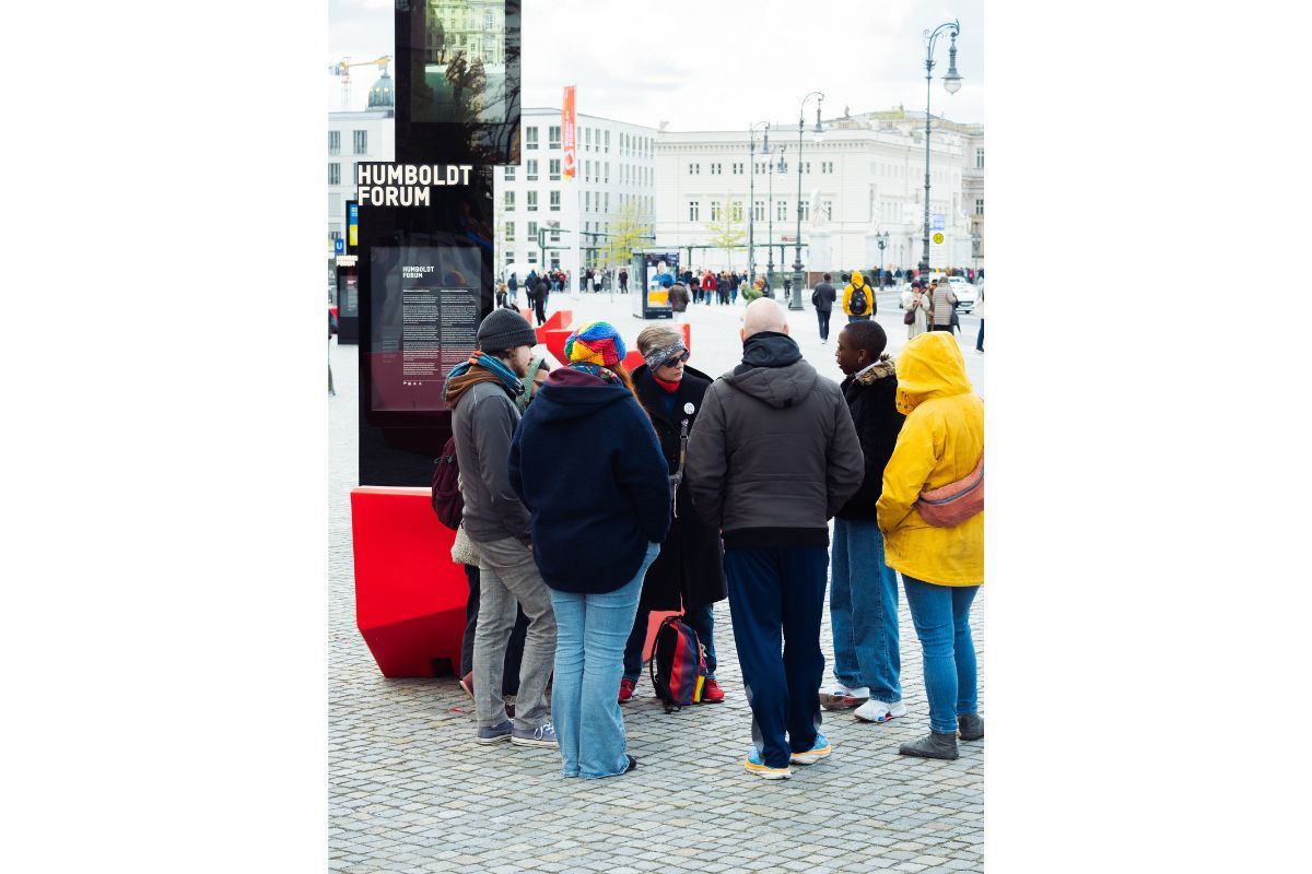 A deSta tour group outside Berlin’s Humboldt Forum, in copyright, Aimé Mvemba