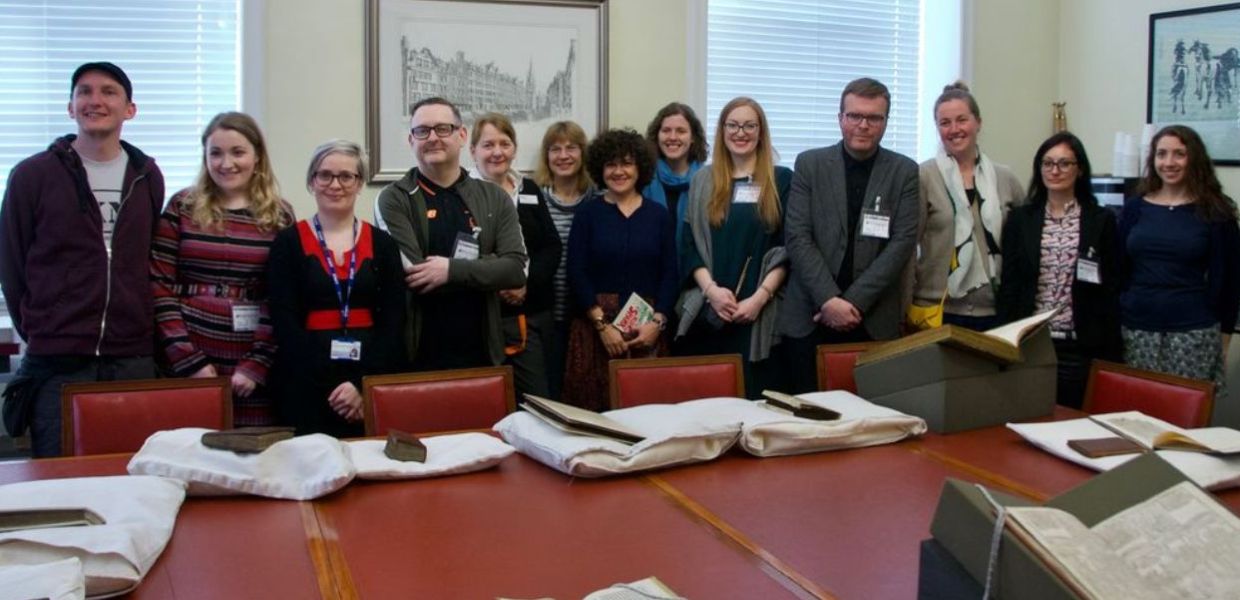 A photo of the editorial planning group of the Rise of Literacy project as they were treated to a special viewing of some of the treasures of the National Library of Scotland’s manuscripts collections.