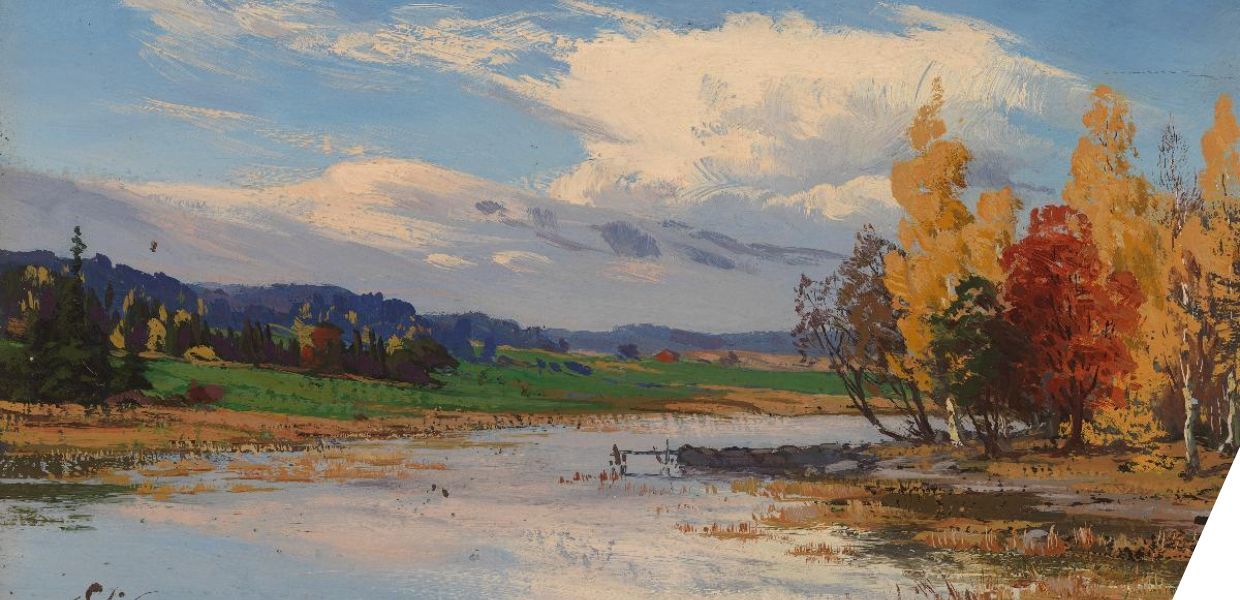 An autumn landscape showing a wide, flooded river, trees with orange and yellow leaves and a sky with two large clouds