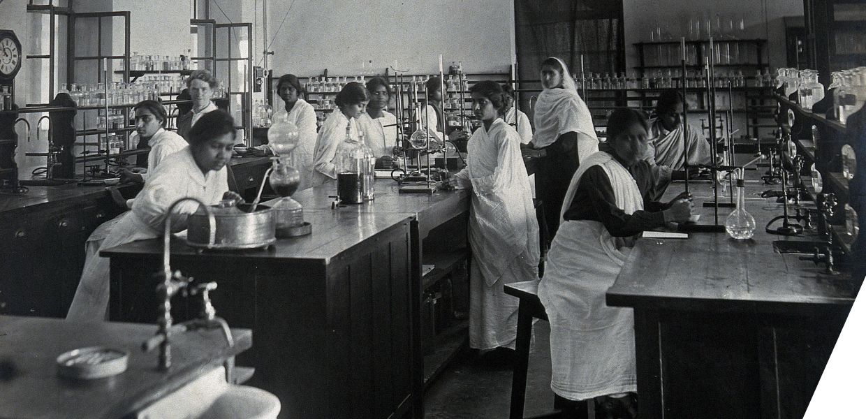 Black and white photograph of women working in a laboratory