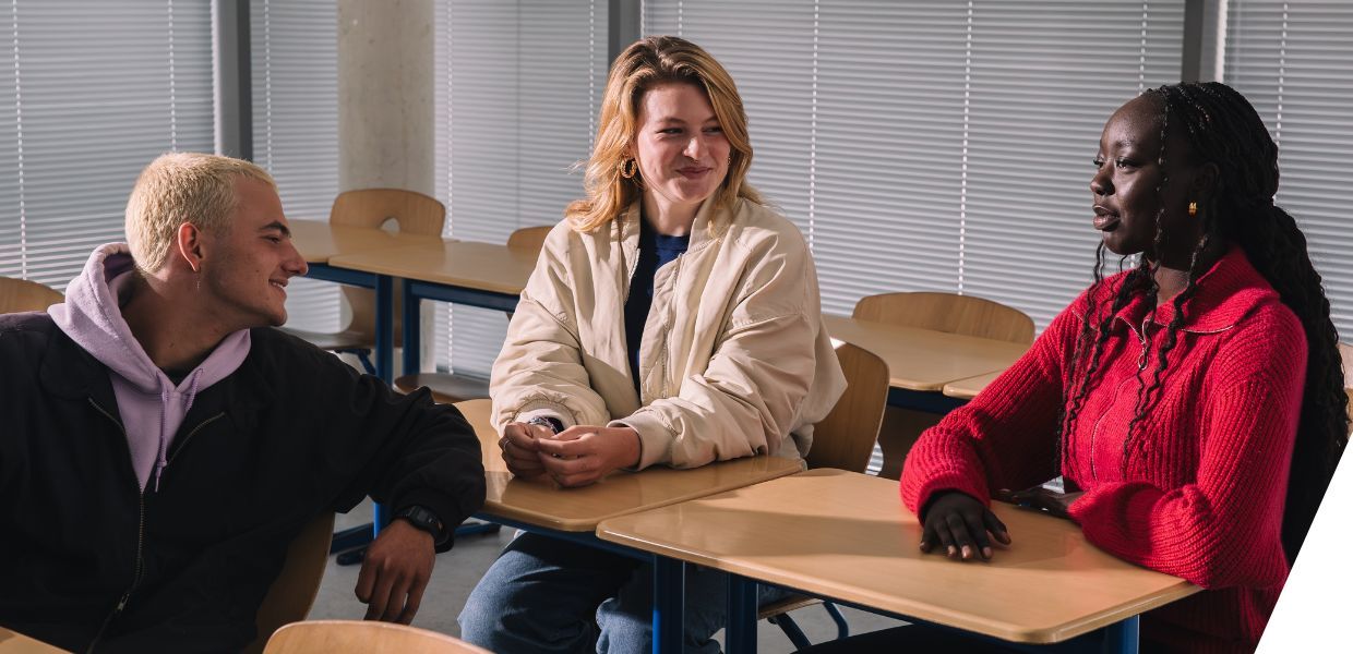 Three students in conversation